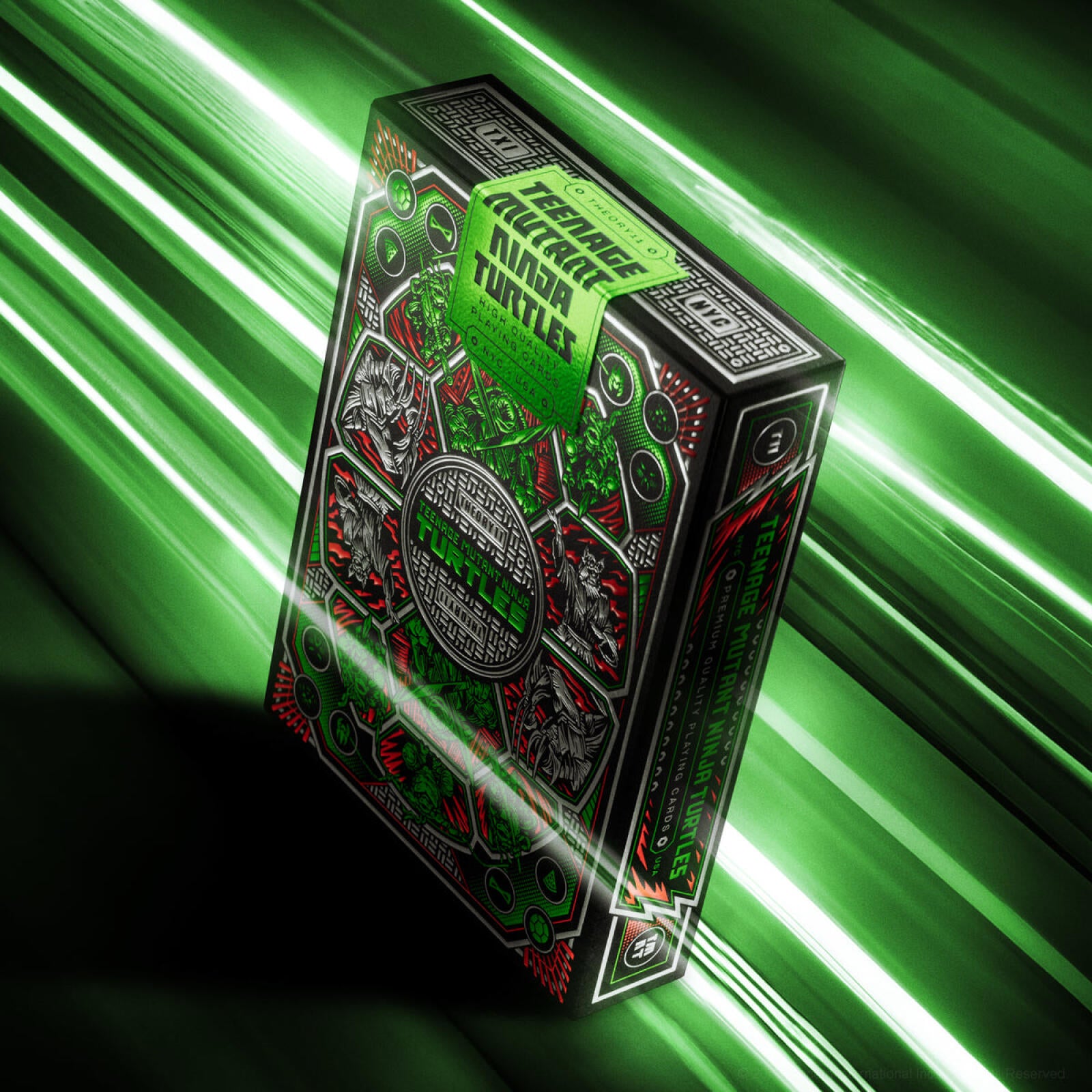 Teenage Mutant Ninja Turtles playing card box with green light effects