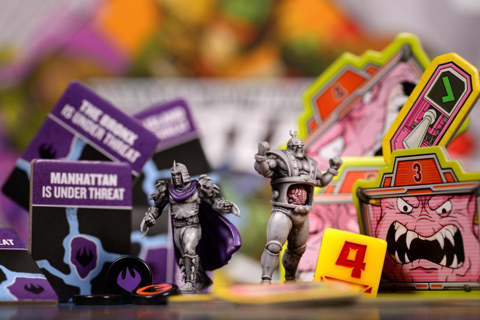Teenage Mutant Ninja Turtles Toy figures and cards on a colorful background